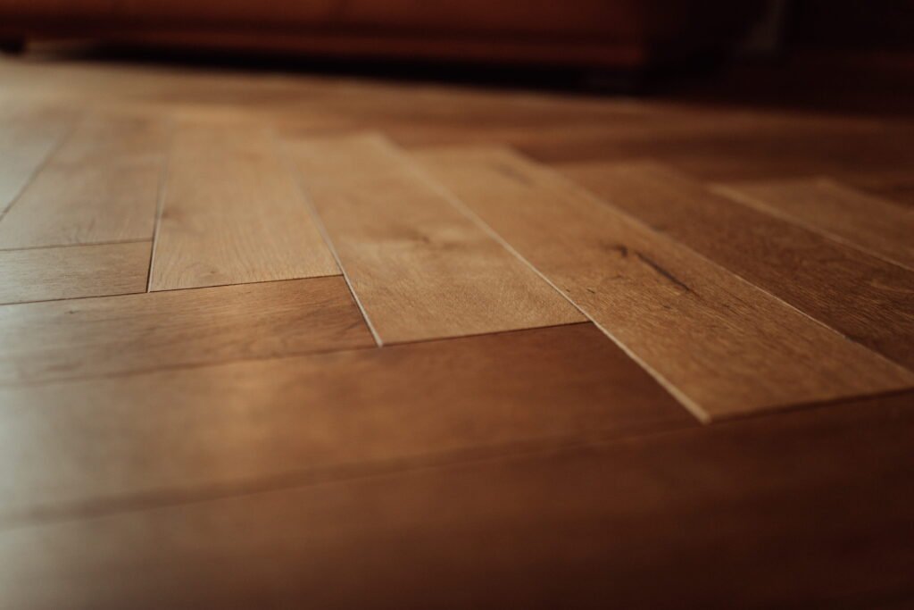 alt="Beautiful hardwood flooring transformation in Houston home"
